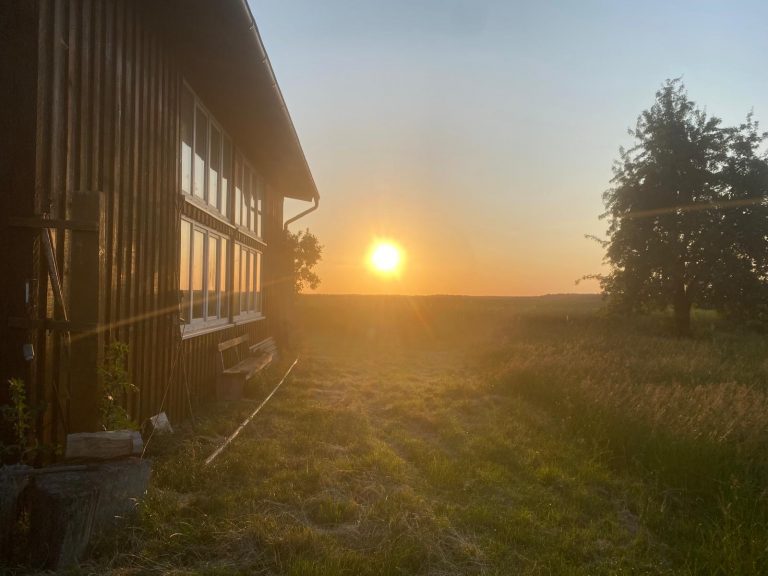 Sundown behind the craftmanshouse of Parsonage of Dewitz